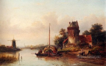  Jan Galerie - Un paysage de rivière en été avec un Haybarge amarré par une ferme fortifiée Jan Jacob Coenraad Spohler